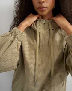 Model wearing Check cargo jacket in check