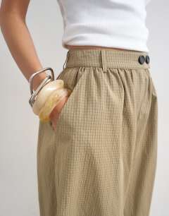 Model wearing Check extreme balloon trouser in neutral