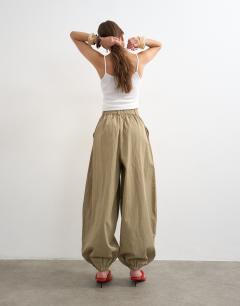 Model wearing Check extreme balloon trouser in neutral