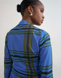 Model wearing Check high neck mesh long sleeve top in blue