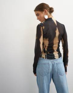 Model wearing Check high neck mesh long sleeve top in mono print