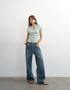 Model wearing Check mesh key hole detail short sleeve top in blue