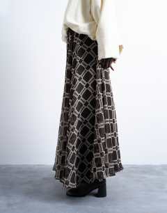 Model wearing Check print full circle maxi skirt in chocolate
