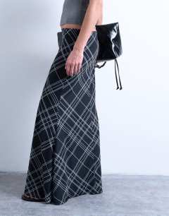 Model wearing Check print maxi skirt in black