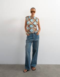 Model wearing Check printed drape back top in multi