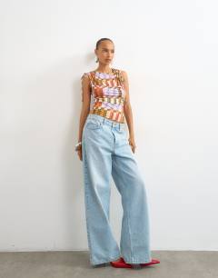 Model wearing Check ruched detail top in red