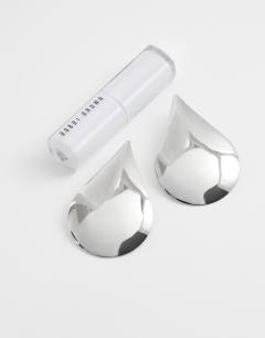 Model wearing Cher statement teardrop stud earrings in silver tone