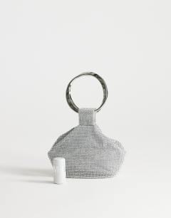 Model wearing Cherry metal handle grab bag in silver diamante