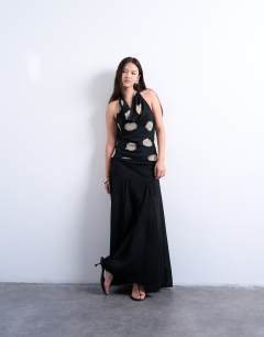 Model wearing Chiffon cowl neck top in mono spot print