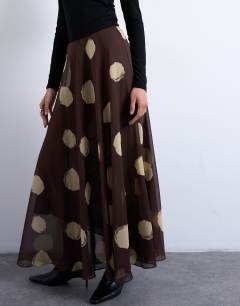 Model wearing Chiffon full maxi skirt in choc spot