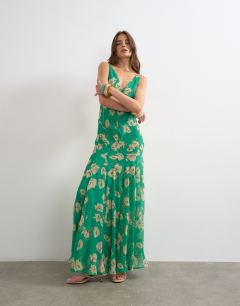 Model wearing Chiffon maxi dress with seam detail in green floral