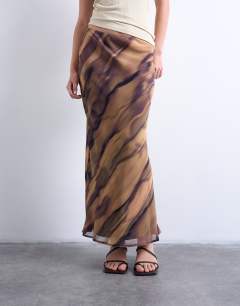 Model wearing Chiffon midi skirt in woodgrain