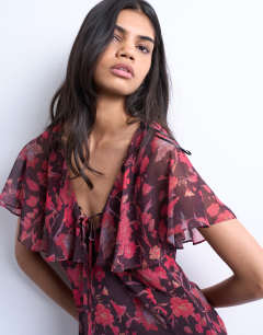 Model wearing Chiffon mini tea dress in rust floral print