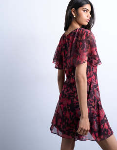 Model wearing Chiffon mini tea dress in rust floral print