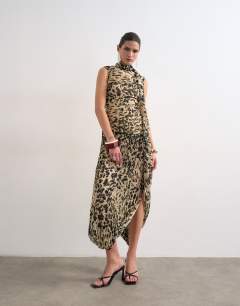 Model wearing Chiffon scarf neck bubble hem maxi dress in buttermilk abstract animal print