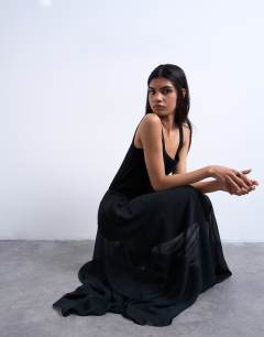 Model wearing Chiffon seam detail circle maxi skirt in black