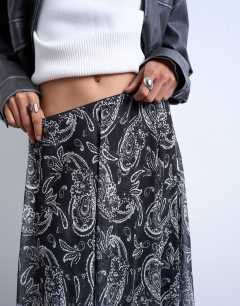 Model wearing Chiffon seam detail circle maxi skirt in paisley print