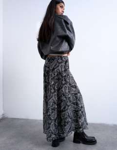 Model wearing Chiffon seam detail circle maxi skirt in paisley print