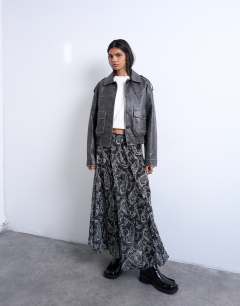 Model wearing Chiffon seam detail circle maxi skirt in paisley print