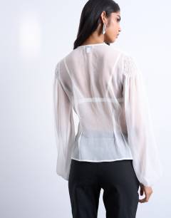 Model wearing Chiffon sheer panel long sleeve blouse in ivory