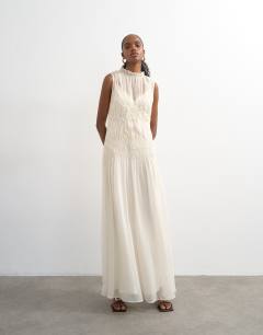 Model wearing Chiffon sleeveless maxi dress with ruched artwork in ecru