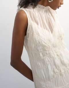 Model wearing Chiffon sleeveless maxi dress with ruched artwork in ecru