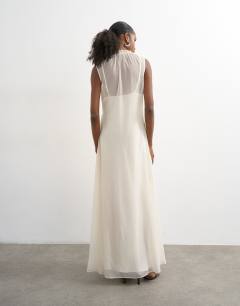 Model wearing Chiffon sleeveless maxi dress with ruched artwork in ecru