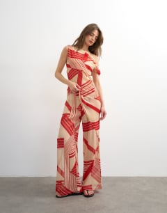 Model wearing Chiffon stripe print wide leg trouser co-ord in red