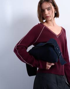 Model wearing Chloe real suede cross body bag in navy