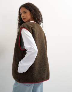 Model wearing Chuck on borg gilet in choc