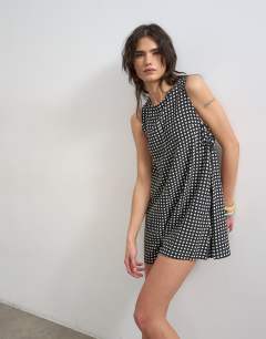 Chuck on boxy playsuit in mono check
