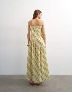 Model wearing Chuck on maxi dress in check