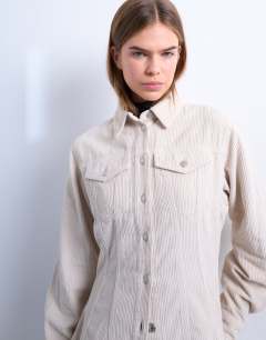 Model wearing Cinch detail shirt in pearl cord