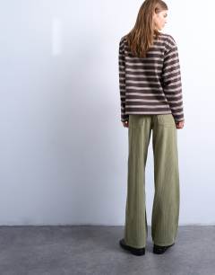 Model wearing Cinch low rise jean in green cord