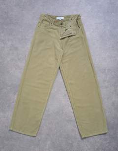 Model wearing Cinch low rise jean in green cord