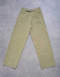 Model wearing Cinch low rise jean in green cord