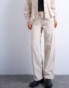 Model wearing Cinch low rise jean in pearl cord