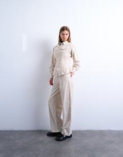 Model wearing Cinch low rise jean in pearl cord