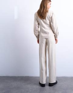 Model wearing Cinch low rise jean in pearl cord