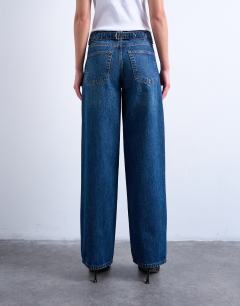 Model wearing Cinch low rise jeans in dark stone wash