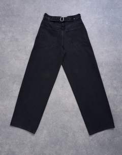 Model wearing Cinch low rise relaxed jean in washed black