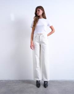 Model wearing Cinch low rise relaxed jean in white