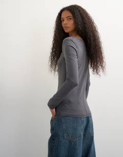 Model wearing Cinch neckline long sleeve top in grey