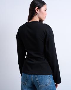 Model wearing Cinch waist structured long sleeve tee in black