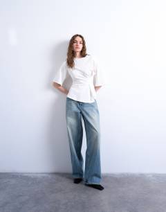 Model wearing Cinch waist structured tee in white