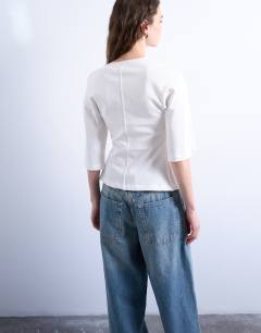 Model wearing Cinch waist structured tee in white