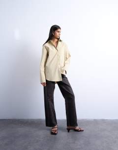Model wearing Cinched oversized poplin shirt in stone