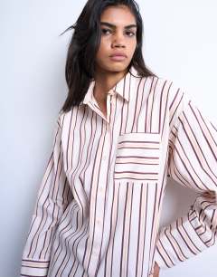 Model wearing Cinched oversized poplin shirt in stripe