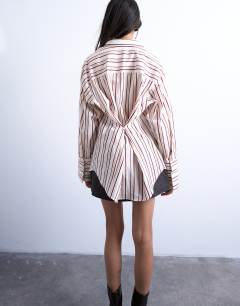 Model wearing Cinched oversized poplin shirt in stripe
