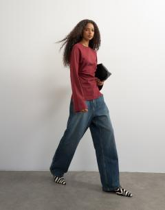Model wearing Cinched waist long sleeve raglan t-shirt in washed burgundy